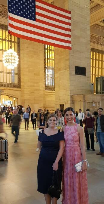 GLOBAL AWARD: Maree Myerscough (pink dress) and her best friend Courtney Gray at Grand Central Station in NYC.