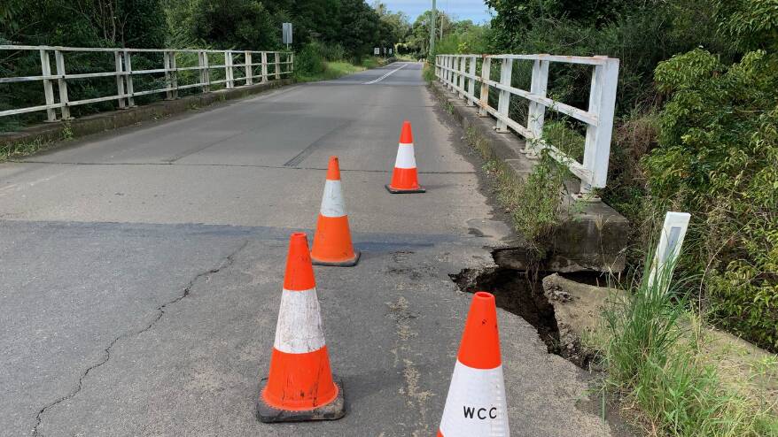 Dapto residents urged to avoid road after bridge collapses