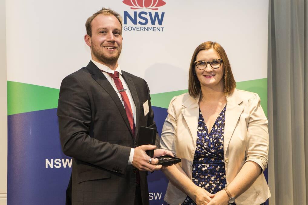 Corrimal High teacher Joel Foster was presented his award by NSW Education Minister Sarah Mitchell.