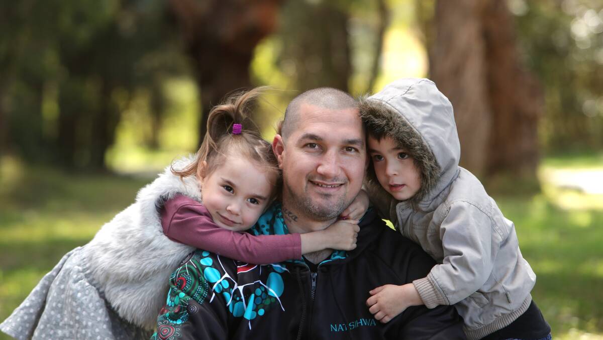 FAMILY MAN: Steve Bastian with his kids Mahalia and Koa. He has two other kids. Picture: Sylvia Liber