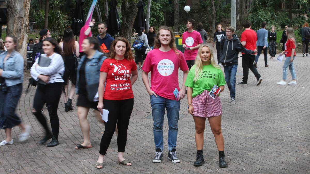 DISAPPOINTED: UOW Liberal Club president Mikayla Barnes (green top) pictured in 2018 with fellow students Chloe Rafferty and Joshua Mills. Picture: Sylvia Liber