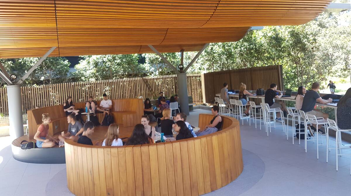 BIG HIT: The new informal learning space under the awning of building 36 is popular with University of Wollongong students.