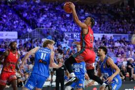 Justin Robinson takes to the basket during the Hawks clash against the Bullets in Brisbane on Sunday. Picture by Russell Freeman/Getty Images
