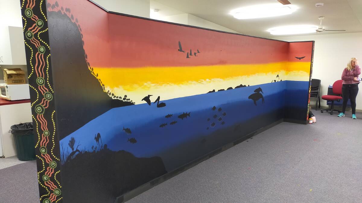MURAL: Aboriginal artists painted two big murals for the TAFE Wollongong campus while completing their Storytelling Through Art short course.