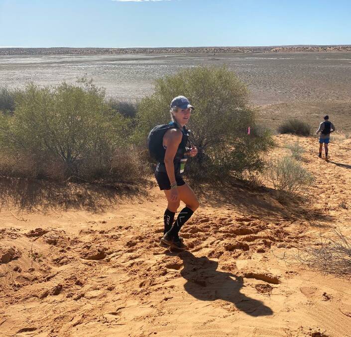 DESERT WARRIOR; Kiama runner Sanchia Gair was the first female to cross the finish line in the Simpson Desert Ultra. Picture: Supplied