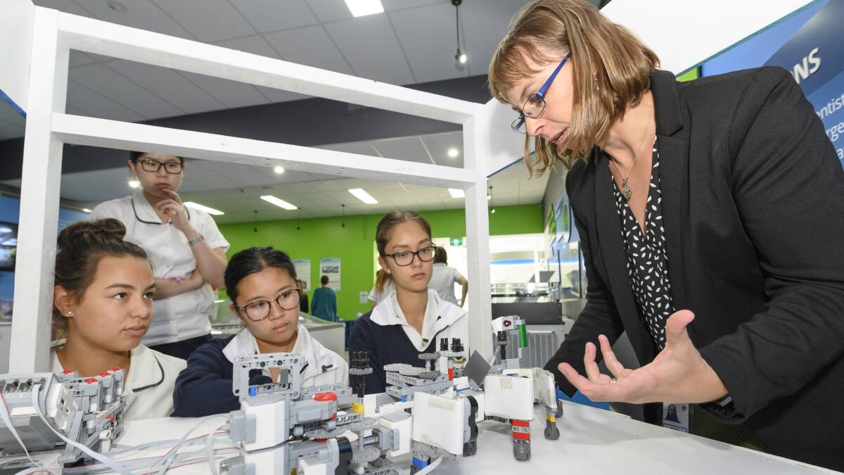 ANSTO scientist Dr Kirrily Rule from Wollongong talking to students about STEM during an International Women's Day event at ANSTO.