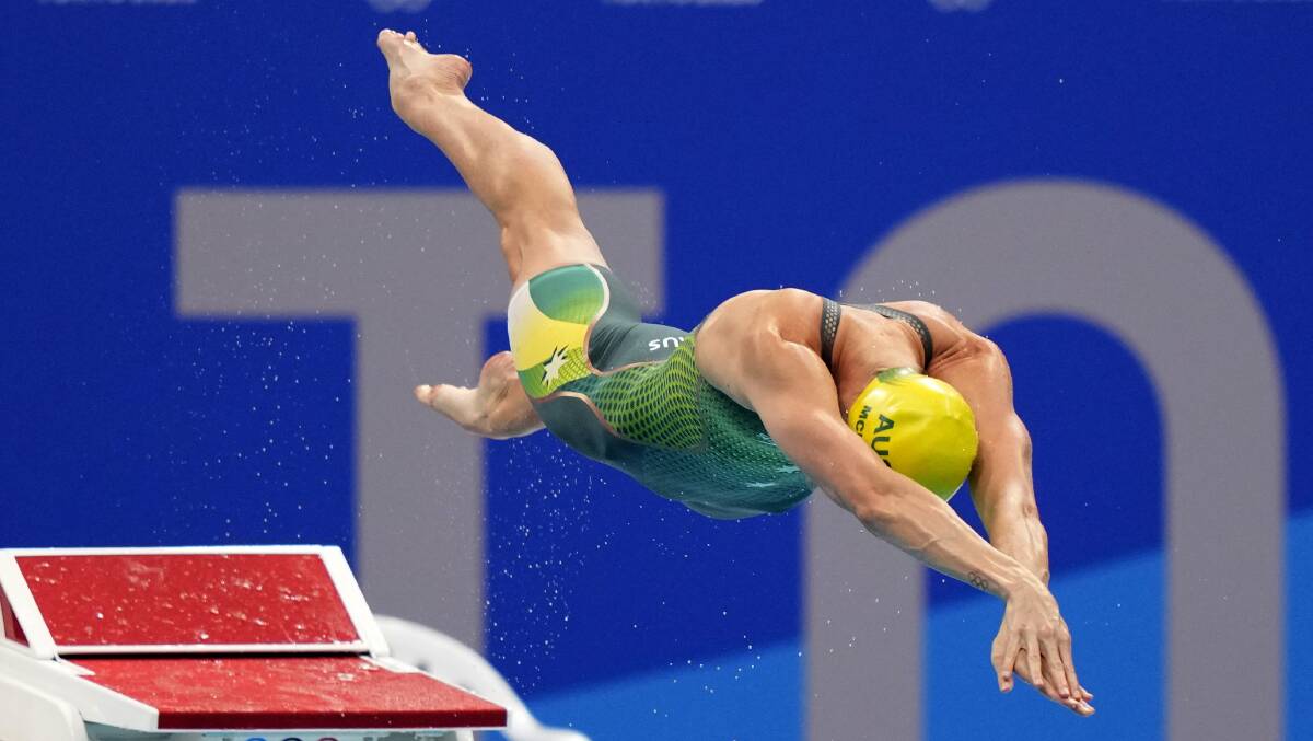 DIVING IN: Emma McKeon dives off the starting block in the women's 50-metre freestyle final at the Tokyo Olympics on August 1. Picture: AP Photo/David Goldman.
