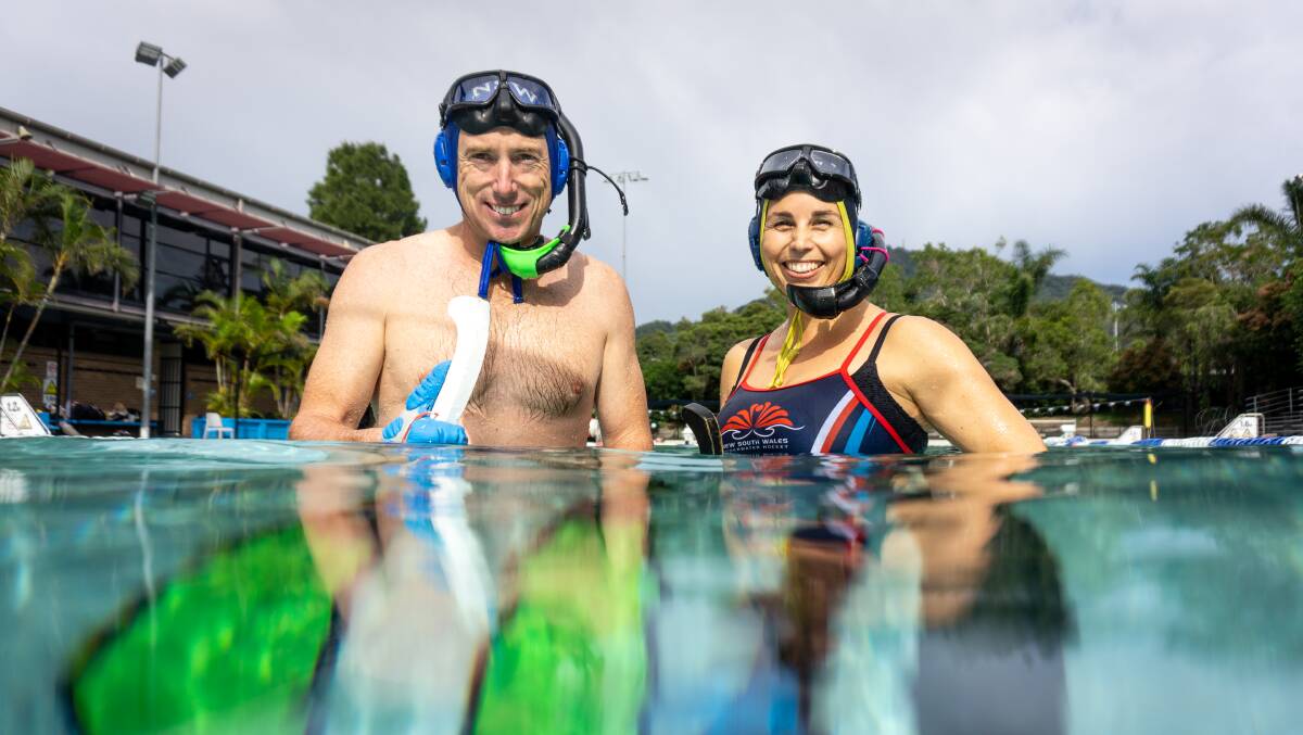 Wollongong University Underwater Hockey Club treasurer Ryan Heckenberg and president Giulia Risorto at UOW pool. Picture: Adam McLean.