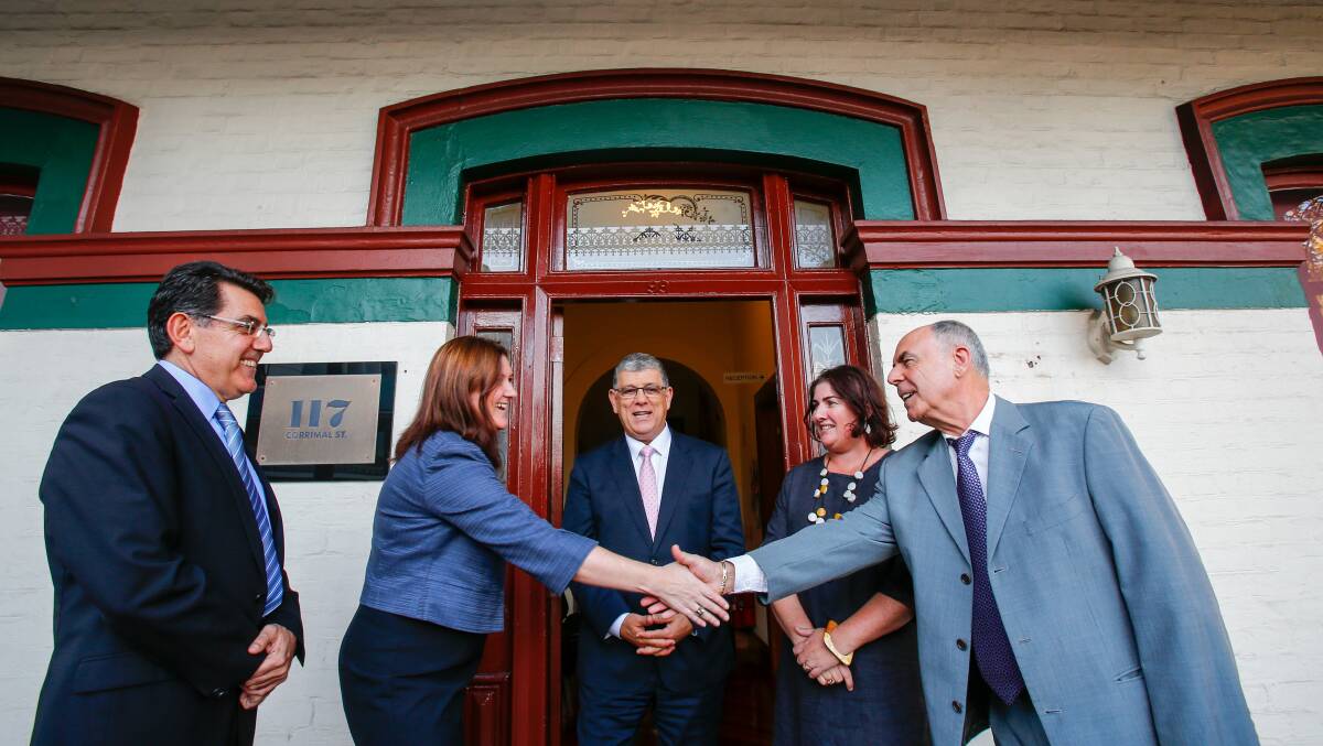 NEW TEAM: Peter El Khouri, Kerry Hunt, Minister for the Illawarra John Ajaka, Kathryn Baget-Juleff and Ken Habak at the Multicultural Community Councils of Illawarra office in Wollongong. Picture: Adam McLean