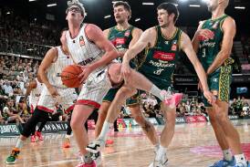 Clint Steindl of the Tasmania Jackjumpers tries to defend Illawarra Hawks centre Lachlan Olbrich during their NBL Seeding Qualifier at MyState Bank Arena on February 28, 2024. Picture by Steve Bell/Getty Images
