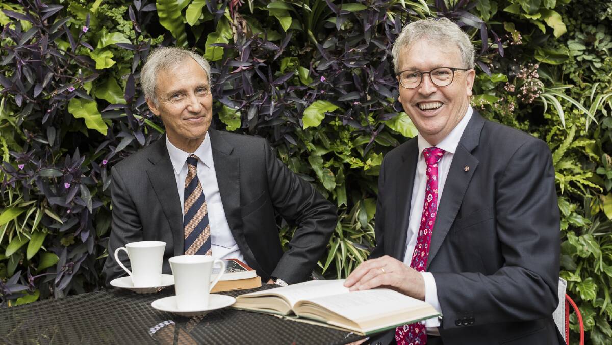 UOW Vice-Chancellor Paul Wellings (right) with Ramsay Centre CEO Simon Haines in December.