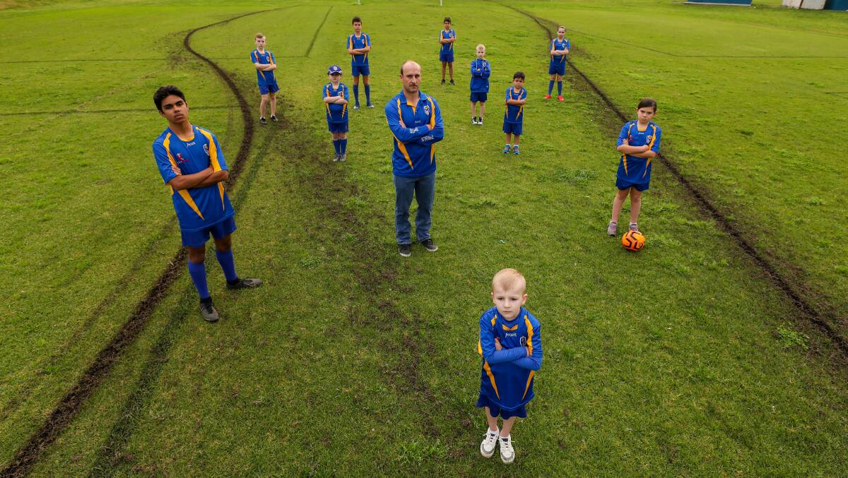 Disheartening: Last August Dapto Phoenix Football Club players and president Ashley Sulcs were disappointed after vandals tore up their field. Picture: Adam McLean