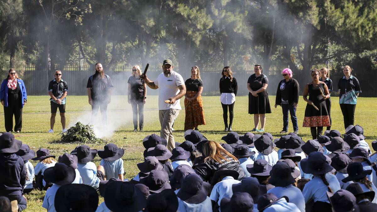 NEW PROGRAM: In April this year Towradgi Public School launched its wellbeing program with a smoking ceremony. Picture: Anna Warr