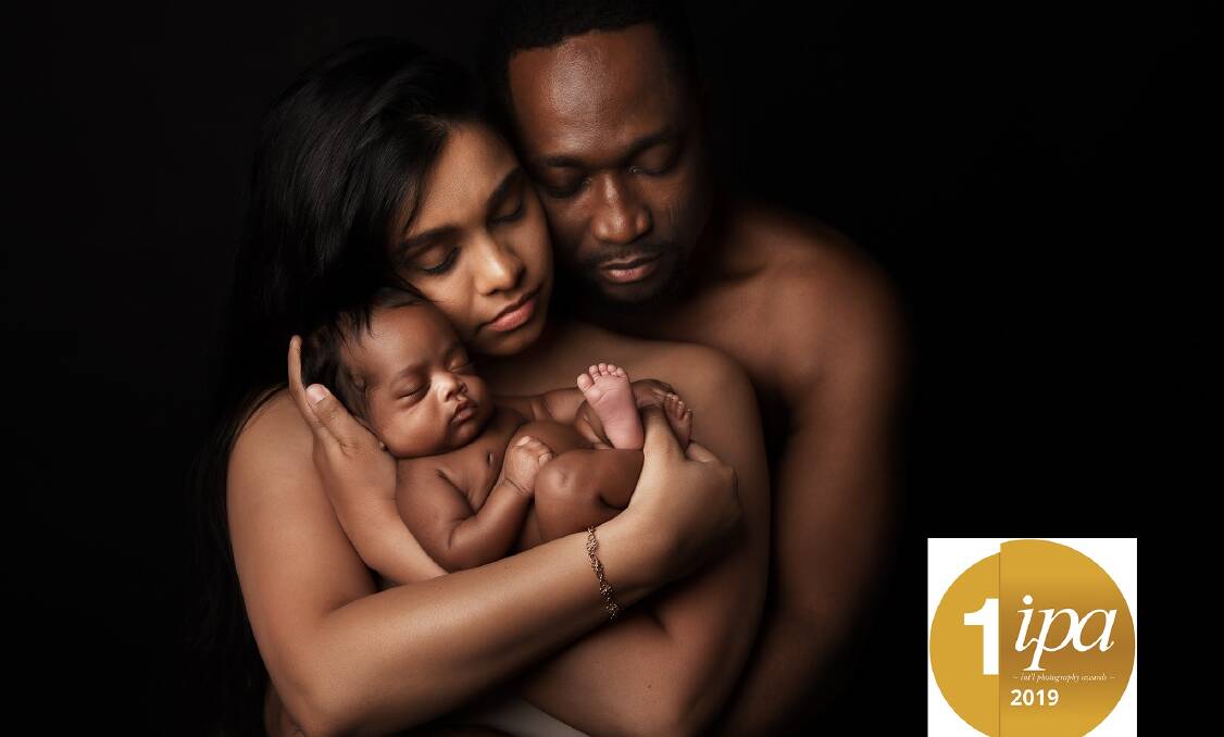 AWARD WINNER: Wollongong photographer Nerida Brain credits TAFE NSW with her success. ABOVE: This photo of a Wollongong couple and their daughter took out the Newborns and Baby International Photographer of the Year title at the International Photography Awards in New York.