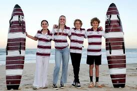 Wollongong City Surf Life Saving Club members Kiah and Isabella Evans alongside Milton and Darcy Stepanovski. Picture by Sylvia Liber