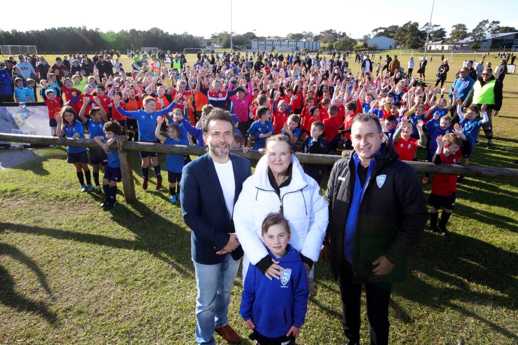 COMMUNITY SUPPORT: Shellharbour Councillor Rob Petreski and Member for Shellharbour Anna Watson with Shellharbour Junior Football Club president Yani Sekuloski and player Brody Sebio. They want synthetic football pitches in the Shellharbour region. Picture: Sylvia Liber. 
