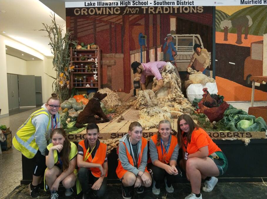 Lake Illawarra High School students in front of their award-winning display at the Sydney Royal Easter Show. 