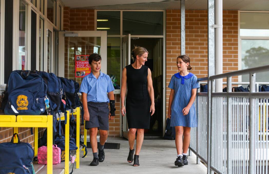 SUCCESS: Holy Cross Catholic Primary School Helensburgh principal Kaylene Duffin and students Nate Amadio and Maddie Bell. Picture: Wesley Lonergan.