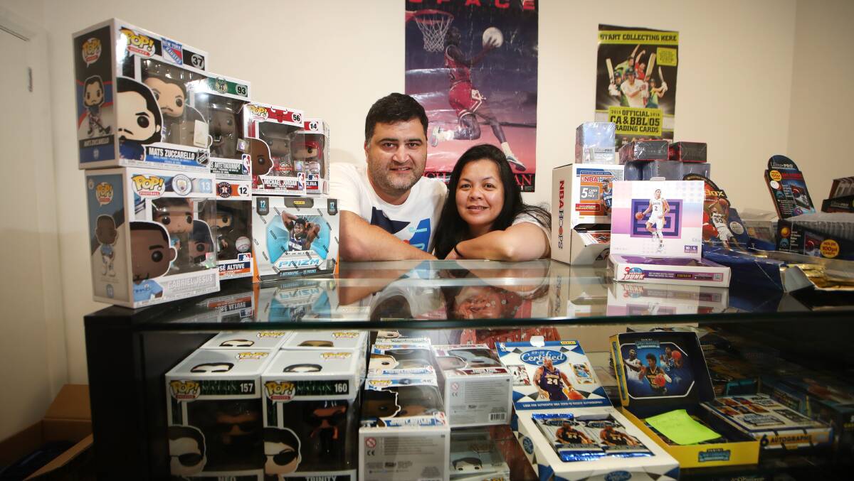 NEW VENTURE: Trading Cards and Collectables' duo Sunil Sen and Bernadette Alfaro at their new Coniston store. Picture: Sylvia Liber 