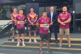 Shellharbour Sharks coach Abed Atallah (front) with his players and a representative of Smart Financial and Mental Health Movement founder Dan Hunt, ahead of the Shellharbour Sharks RLFC shootout tournament at Ron Costello Oval on Saturday, March 2. Picture supplied 