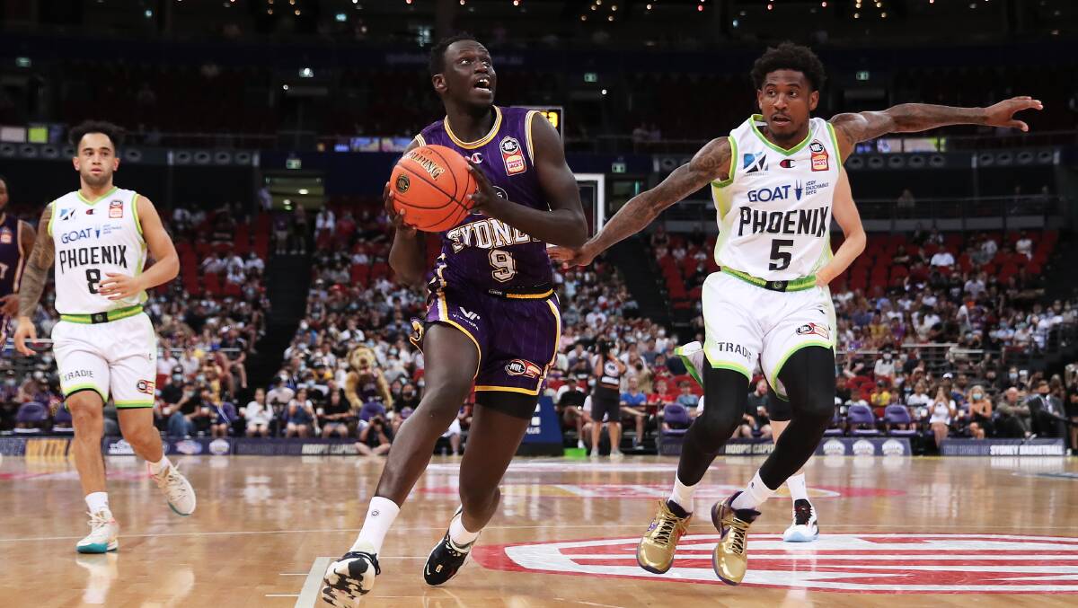 SIGNING: The Illawatta Hawks have finally got one over the Sydney Kings, snaring championship winner Wani Swaka Lo Buluk to the club. Picture: Getty images.