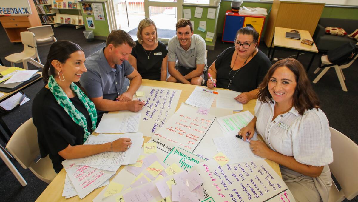 COLLABORATIVE APPROACH: Holy Cross Catholic Primary School Helensburgh teachers Emily Costello, Jeff Body, Anne Rowles, Christopher Whitehall, Lucy Barbuto and Natalie Baker. Picture: Wesley Lonergan.
