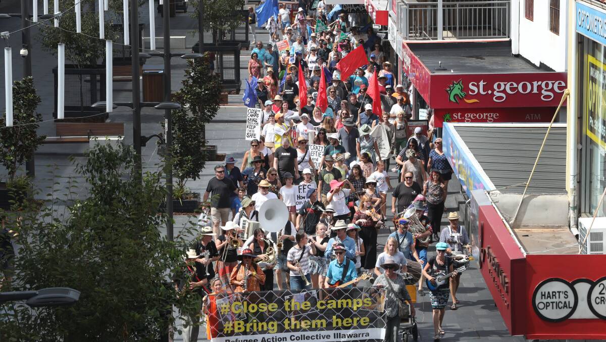 Hundreds rallied in Wollongong on Palm Sunday. Organisers are hoping for another big turnout to World Refugee Week Rally in Wollongong on June 23. Picture: Robert Peet