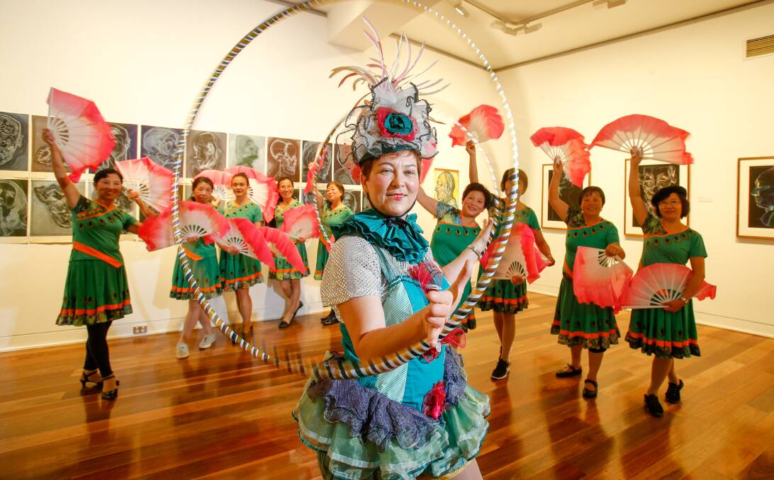 CELEBRATION OF COLOUR: Chinese fan dancers from the Wollongong Sunset Activity Group and Sharon Pusell from Circus Wow will perform in front of an expected 20,000 at this year's Viva La Gong. Picture: Adam McLean