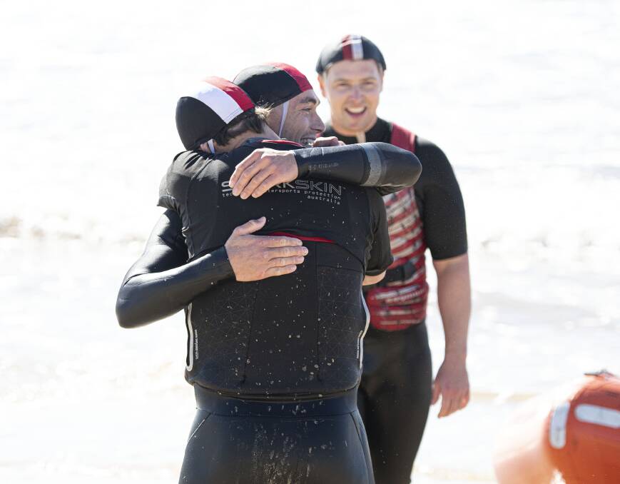 CELEBRATIONS: Kiama Downs SLSC competitors celebrate after winning the club's ninth IRB title overall and sixth in the last seven years of competition. Picture: Malcolm Trees