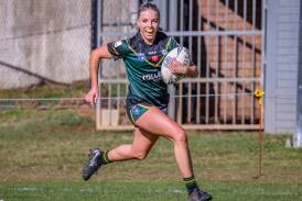 Grace Adams crossing for one of the two tries she scored for Eagle Rays in their 54-4 win over Nowra Bomaderry Jets. Picture by Game Face Photography