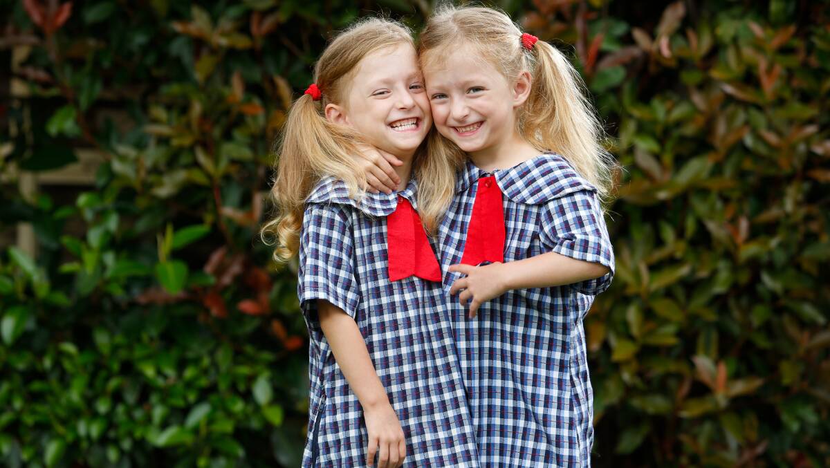 DOUBLE TROUBLE: Albion Park identical twins Jacinta and Kyah Harvey can't wait to start kindergarten at Mount Terry Public School. Picture: Anna Warr