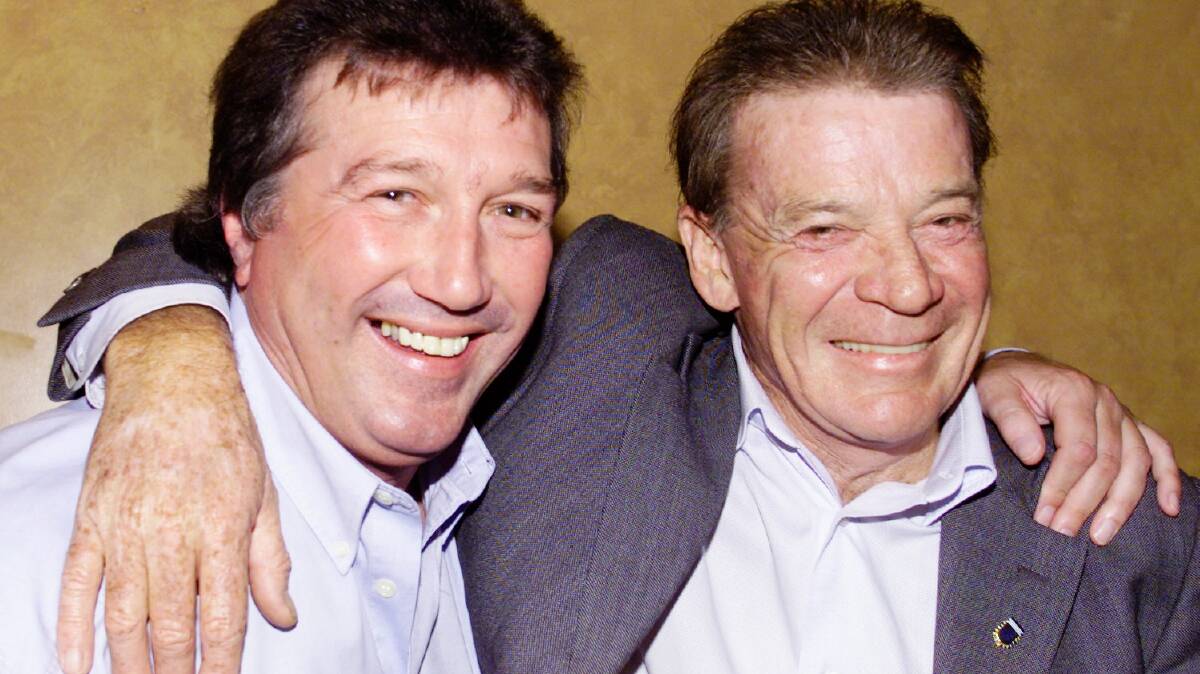 Adrian Alston pictured with his 1974 Socceroos team-mate Johnny Warren at Tarrawanna Soccer Club's Sportsma Luncheon in 2003. Picture by Wayne Venables