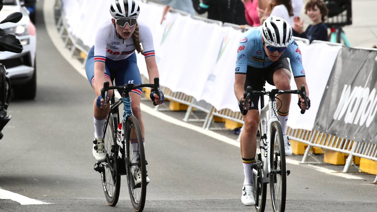 Eleynor Backstedt from Great Britain and Belgian rider Julie van de Velde led the women's elite road race for almost two laps of the city circuit. Picture: Adam McLean