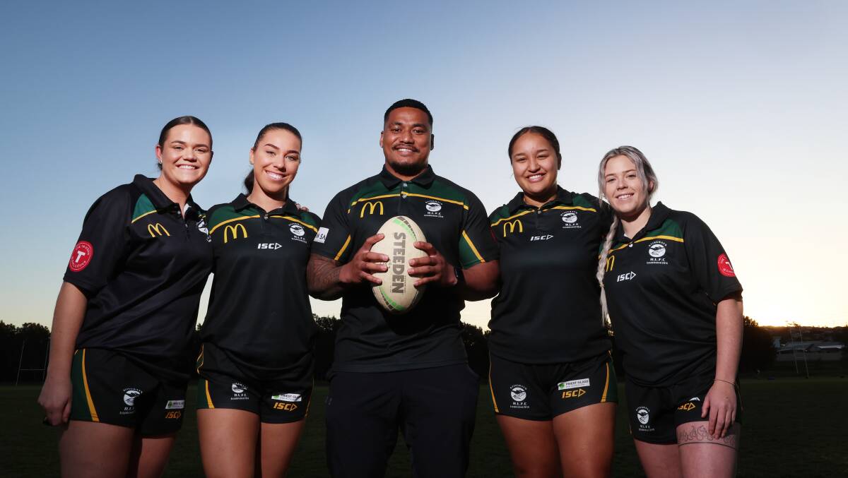 Shellharbour Stingrays player Junior Vaivai (centre) with Shellharbour Stingrays Open Womens Tackle team members Georgia Scott, Olivia Mitchell, Tiarne Kore and Erin Reay. Picture by Sylvia Liber
