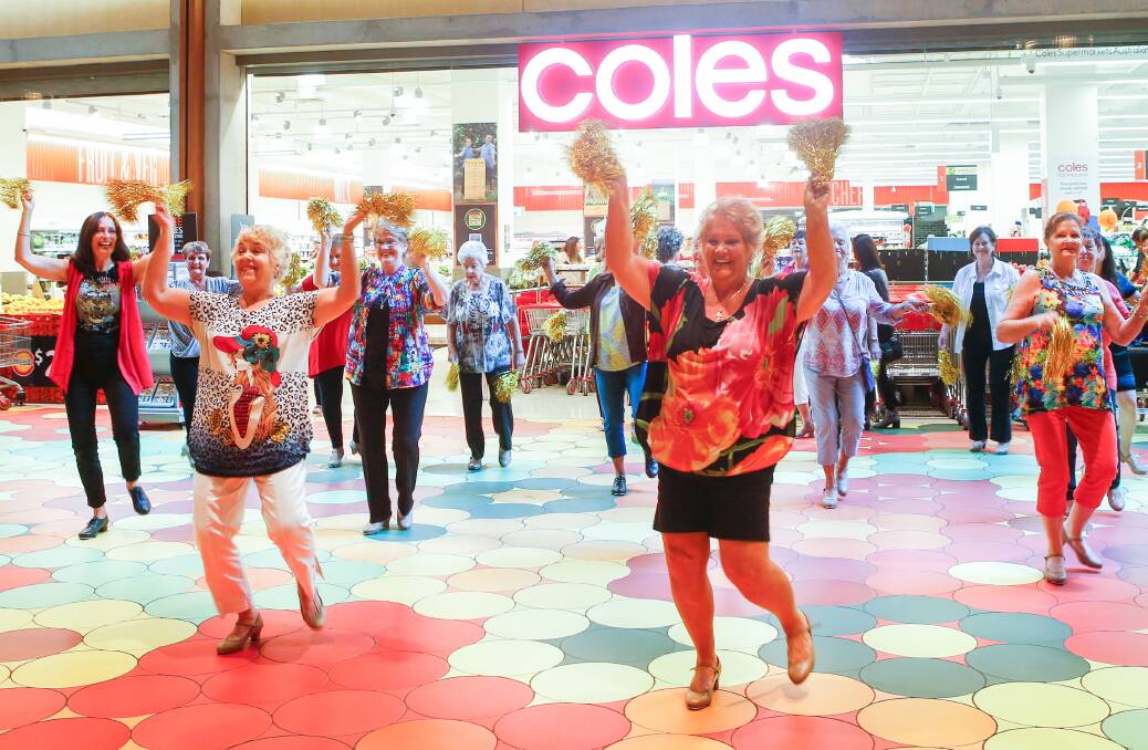 The Silver Belles had one and all up on their feet dancing during their flash dance mob in Wollongong on Friday. Picture: Adam McLean
