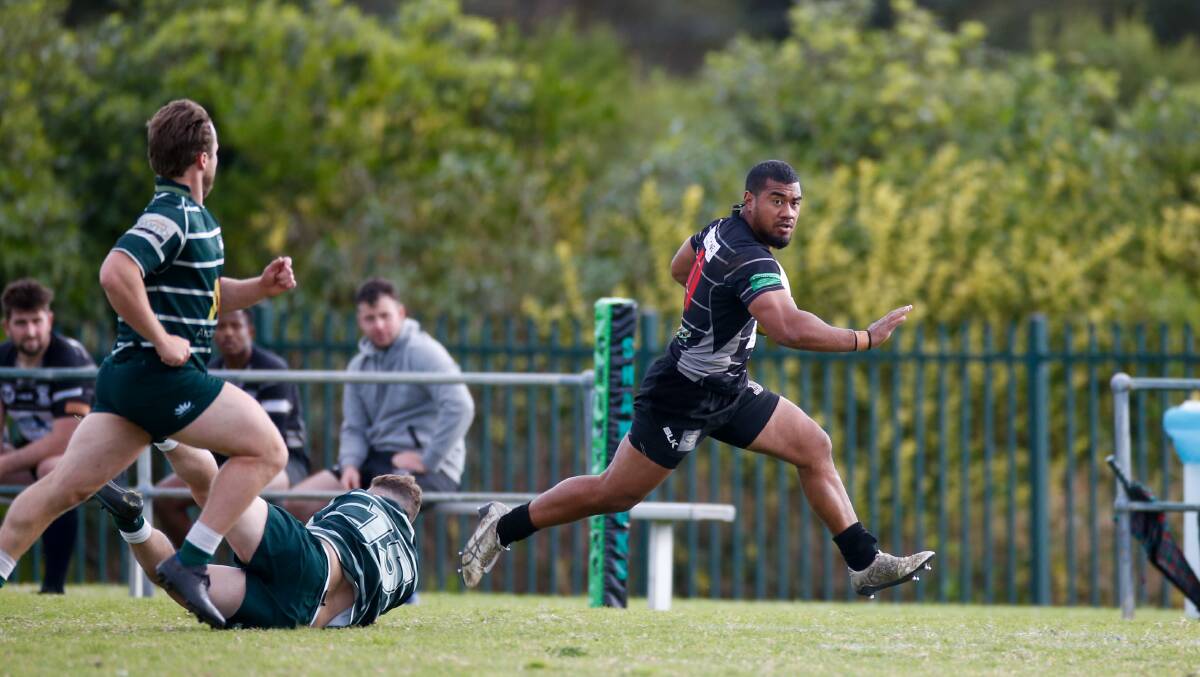 POWERFUL: Kiama winger Tonga Junior-Tongo leaves Shamrocks defenders in his wake on the way to scoring a try in his team's 40-26 loss at Ocean Park. Picture: Anna Warr 