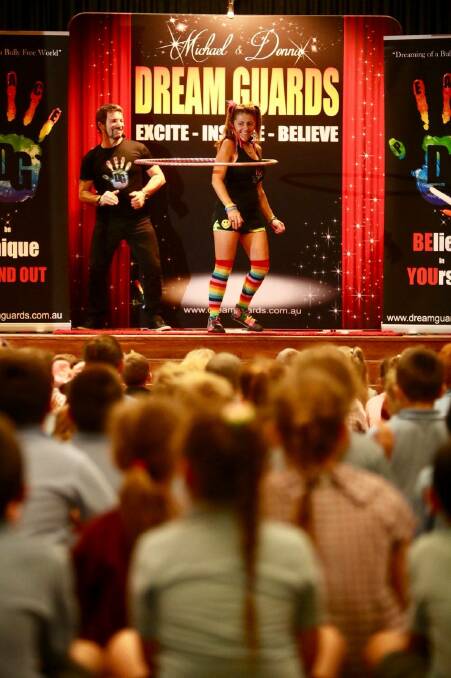 TOUR OF RESILIENCE: Dream Guards duo Michael Bennett and Donna-Leigh Perfect performing at Lakelands Public School. Picture: Adam McLean