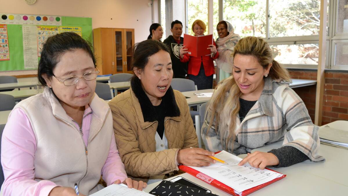 INSPIRED: TAFE NSW Wollongong and Shellharbour teacher Shirine Sleiman (right), who only emigrated to Australia in 2007, enjoys inspiring others to learn English. Picture: Supplied.