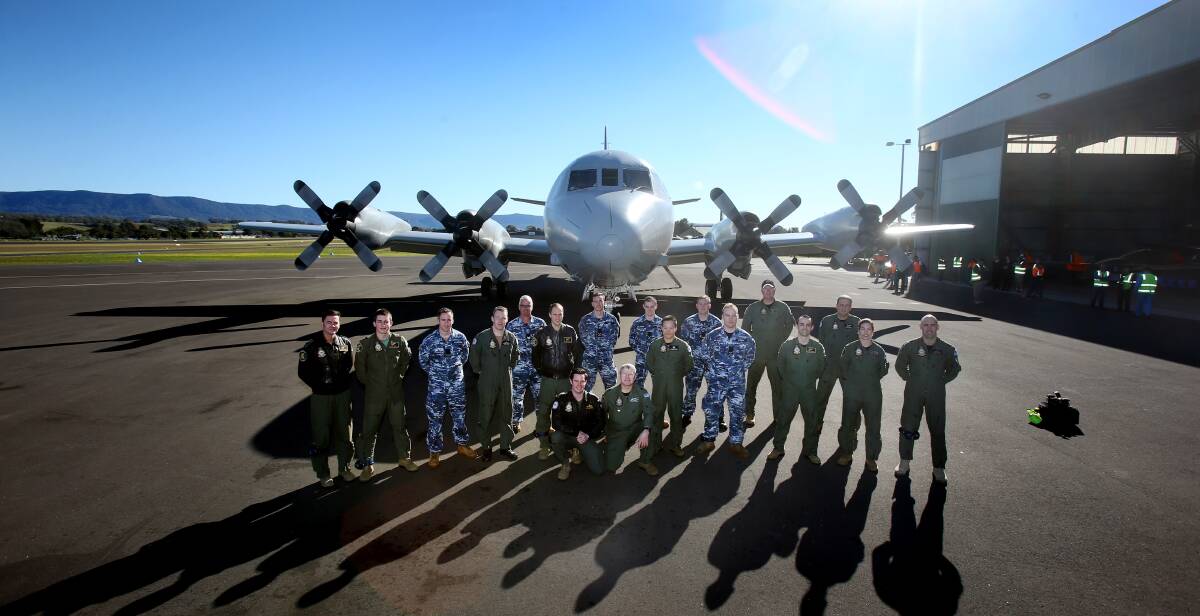 HARS VISIT: The 19-strong crew of the P3 Orion dropped in to HARS at the Illawarra Regional Airport in Albion Park Rail for a quick visit on Saturday. 