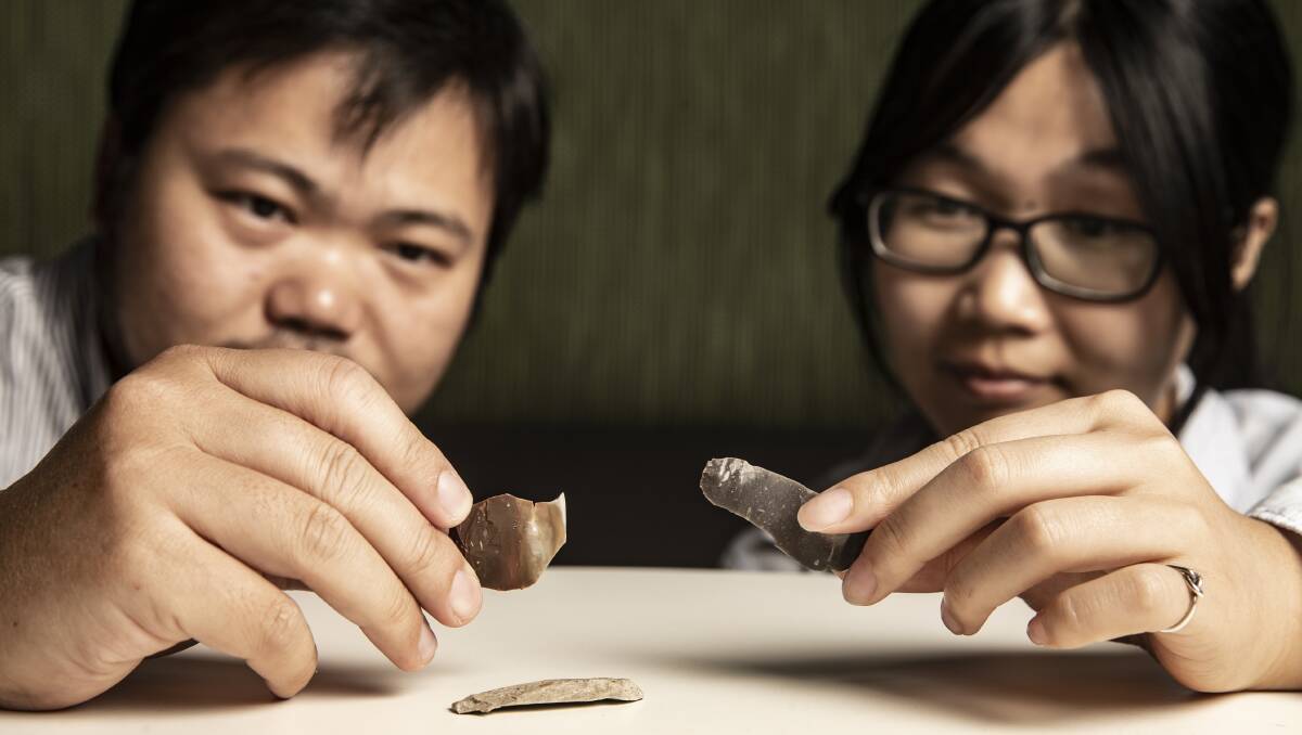 STONES TELL NEW STORY: Associate Professor Bo Li from UOW’s Centre for Archaeological Science and Xue Rui were part of the research team.