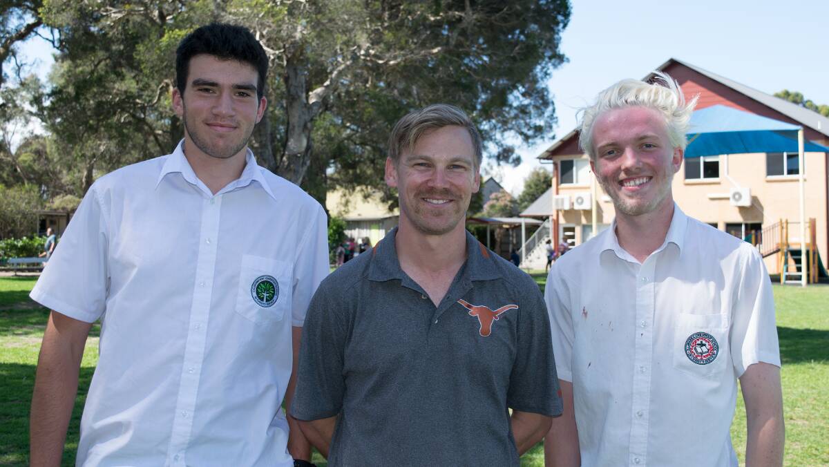 MOVEMBER MEN: Calderwood Christian School students Peter Chayna and Lachlan Clarke with school sports coordinator Ross Graham. Picture: Supplied

