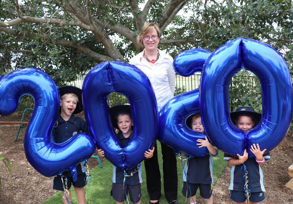 NEW BOSS; New Shellharbour Anglican College principal Megan Hastie with students.