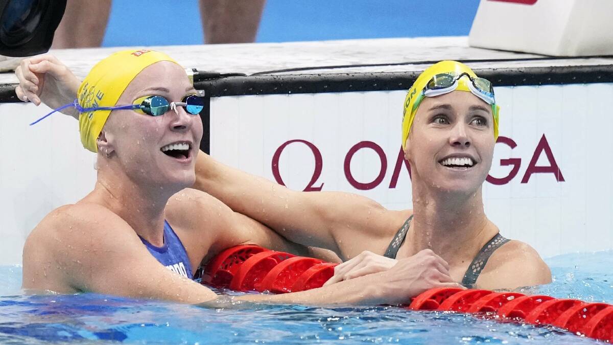 CHAMPION: Emma McKeon (right) and Sweden's Sarah Sjoestroem congratulate each other after finishing first and second in the women's 50-metre freestyle final. Picture: Kyodo via AP