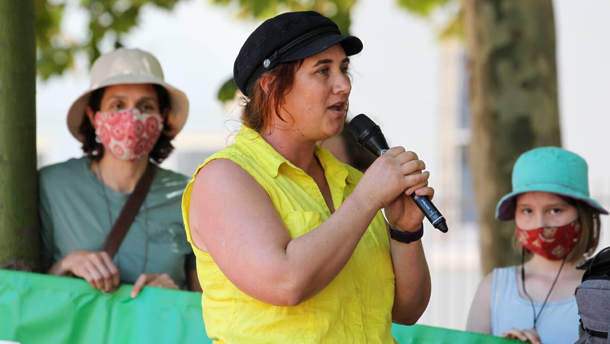 Wollongong Greens councillor Mithra Cox speaks at the Global Day of Action protest in Wollongong on Saturday, November 9. Picture: Anna Warr