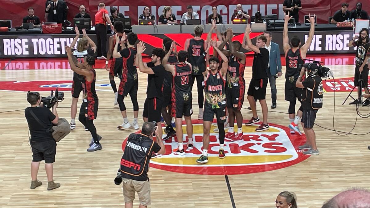 The Illawarra Hawks thank their fans after beating Perth Wildcats 100-82 at the WEC on Friday night. Picture by Agron Latifi