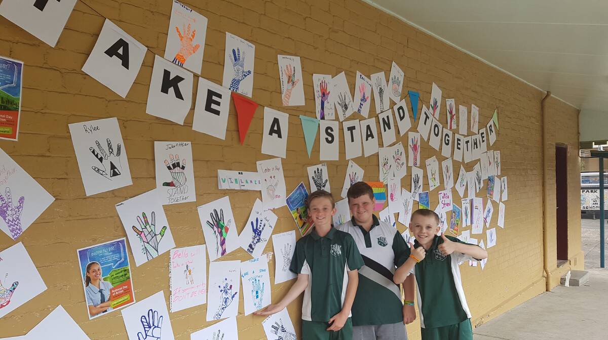 TAKING A STAND: Albion Park Public School students Jack Astill, Tyler Reid and Jake McDonald supporting the National Day of Action Against Bullying & Violence. 