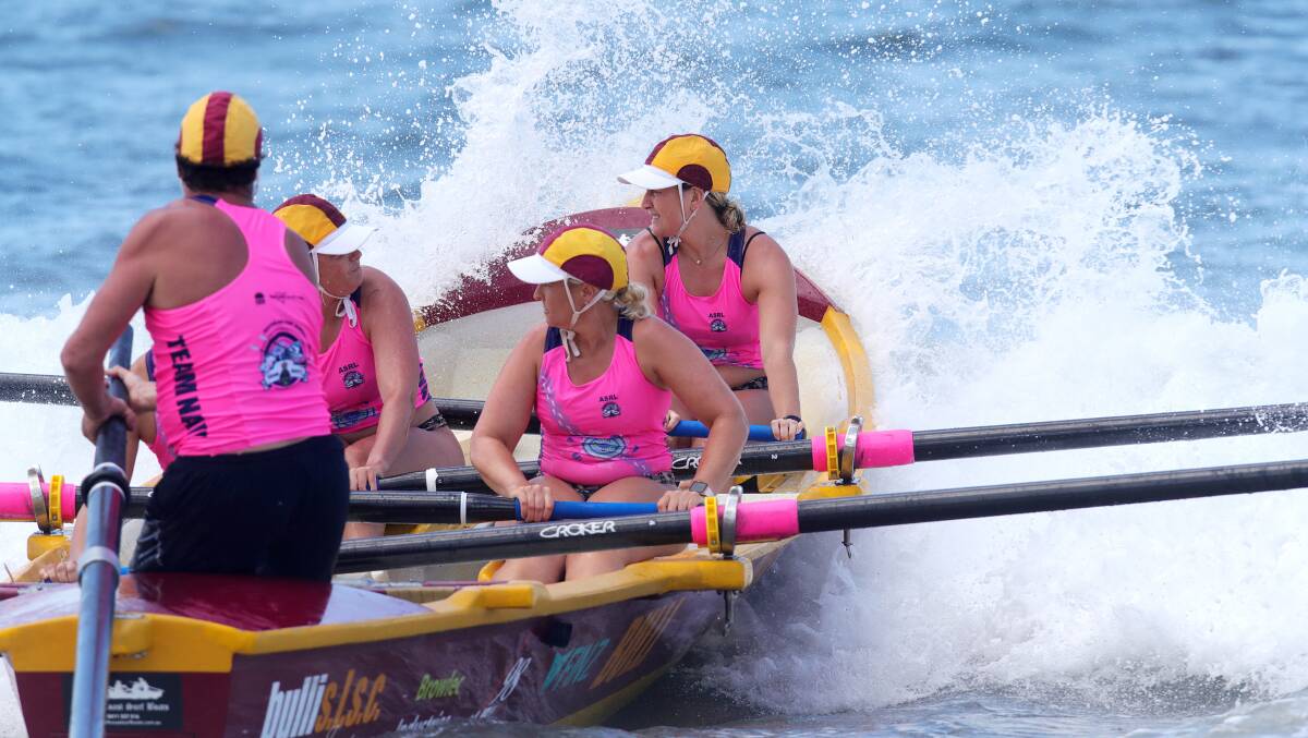 The female Bulli SLSC surf boat crew competing in the ASRL Open at Bulli Beach. Picture: Sylvia Liber
