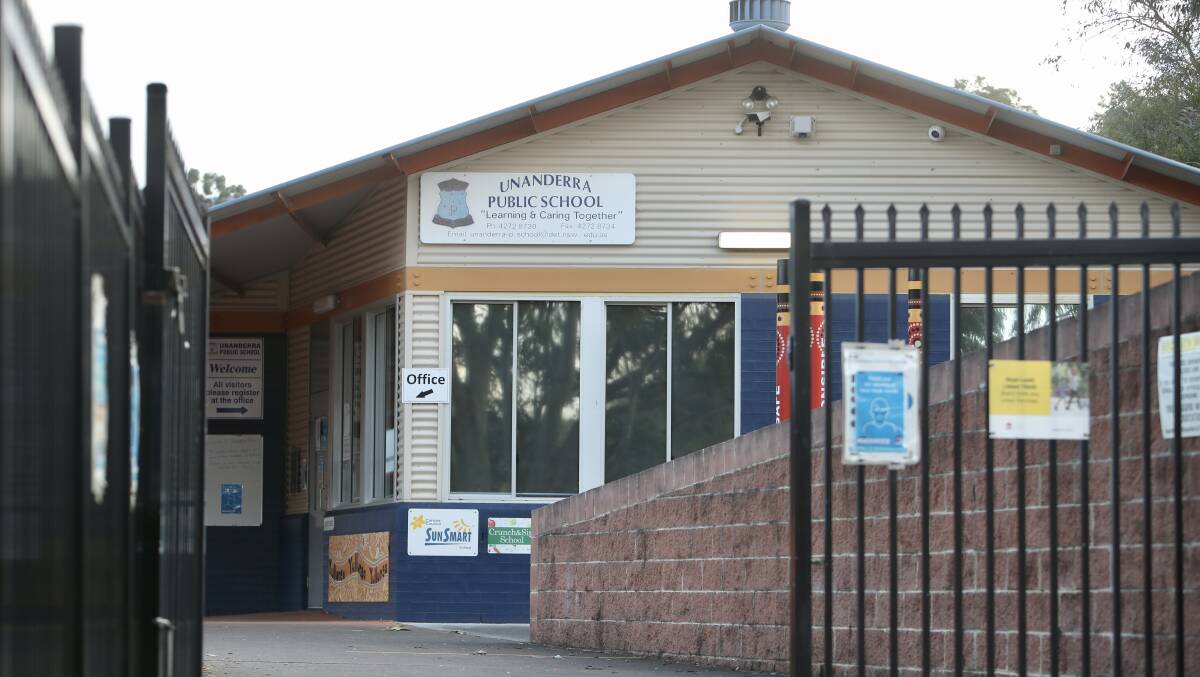 OPEN POLICY: Unanderra Public School is one of many across Greater Sydney to have sent emails urging parents to keep their kids at home.