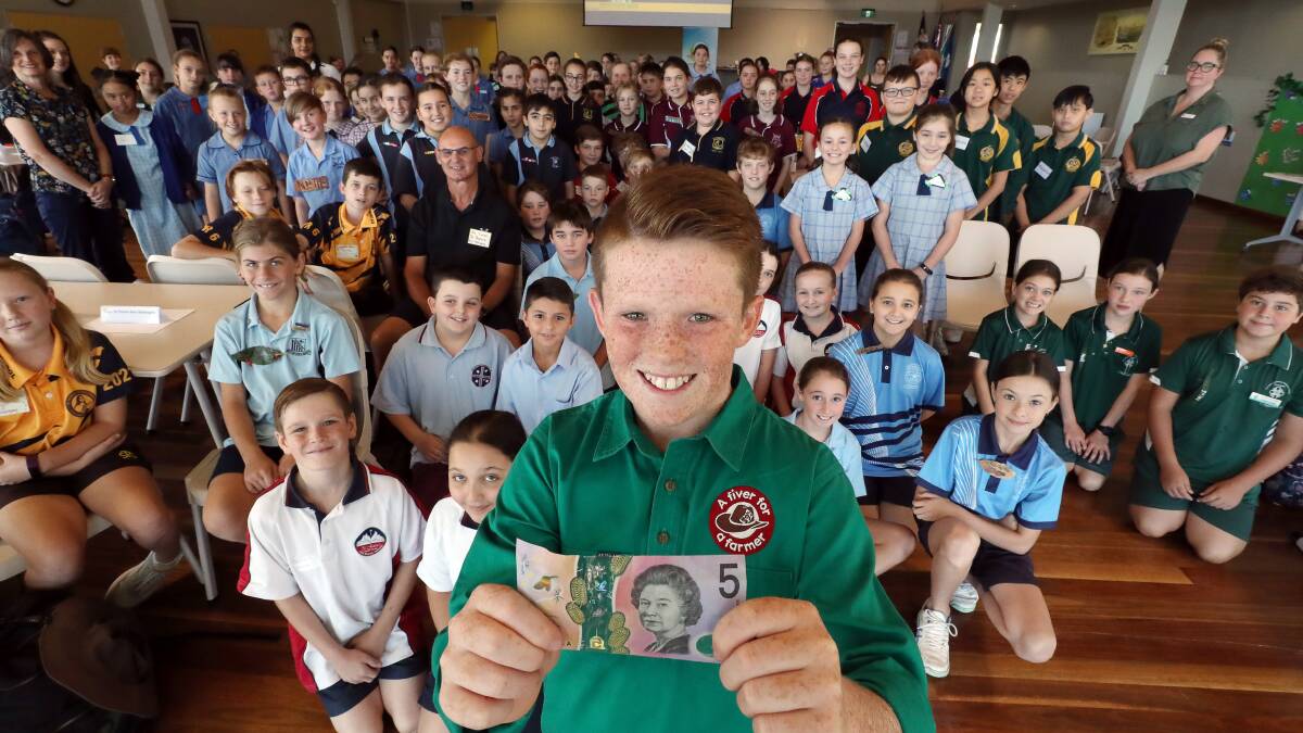 KING OF THE KIDS: Fiver for a Farmer founder Jack Berne spoke at the special environment day held at St Pauls Catholic Parish Primary School, Albion Park on Friday. Picture: Robert Peet.