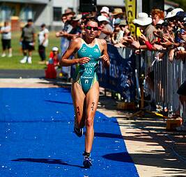 Natalie Van Coevorden runs to the finish line in second place of the Devonport Triathlon. Picture supplied